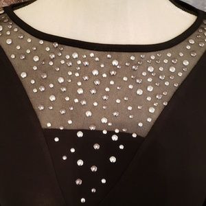 Cable and gauge long sleeve top